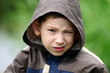 Foto: A portrait of a thoughtful boy in sweatshirt A portrait of a thoughtful boy in sweatshirt