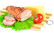 Arrangement with meat smoked bacon, tomatoes and cheese