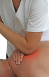 Massage therapist applying acupressure Massage therapist applying acupressure