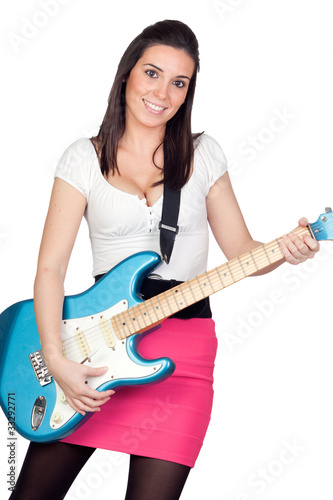 Photo: Attractive girl with a blue electric guitar Attractive girl with a blue electric guitar