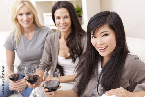 Photo: Interracial Group Three Women Friends Drinking Wine Together at Interracial Group Three Women Friends Drinking Wine Together at