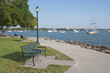 Green metal benches at the Sarasota Marina, Sarasota, FL. Green metal benches at the Sarasota Marina, Sarasota, FL.