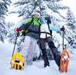 Hiker walks in snow forest