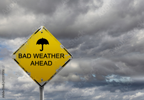 Foto: warning sign of bad weather ahead warning sign of bad weather ahead