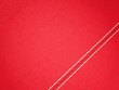Diagonal stitched red leather background