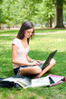 A pretty young student with study materials A pretty young student with study materials