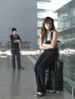 Asian Chinese girl in argument with guy at the airport Asian Chinese girl in argument with guy at the airport
