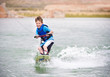 Young Boy learning to Wakeboard