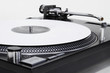 Turntable with white vinyl record