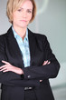 Unimpressed woman with her arms folded