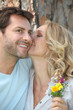 Romantic couple with wild flowers