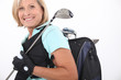 elderly woman liking golf