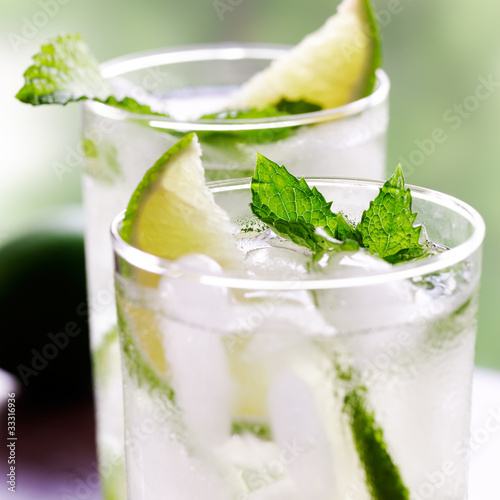 Photo: two mojitos closeup with selective focus two mojitos closeup with selective focus
