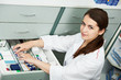 Pharmacy chemist woman in drugstore