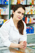 Pharmacy chemist woman in drugstore