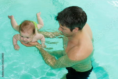 Photo: water playing father child water playing father child