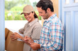 Man taking delivery of a parcel