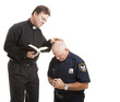 Photo: Priest Blesses Policeman Priest Blesses Policeman