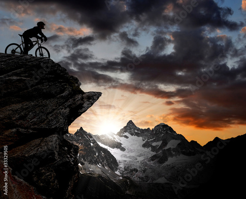 Photo: silhouette of a biker in the Swiss Alps silhouette of a biker in the Swiss Alps
