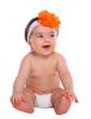Baby girl smiling in diaper