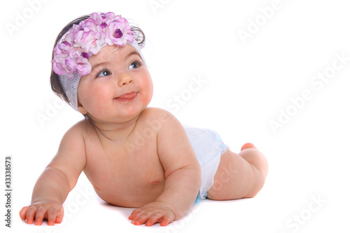 Photo: Baby Girl smiling on the floor Baby Girl smiling on the floor