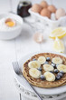 Freshly prepared crepes with banana & blueberries
