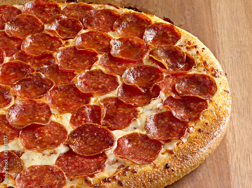 Photo: pepperoni pizza closeup pepperoni pizza closeup