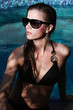 Woman and swimming pool