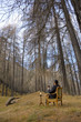 man sitting on the chair drinking wine