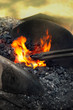 Blacksmith heating up iron - detail Blacksmith heating up iron - detail