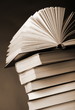 Pile of books on a black background Pile of books on a black background
