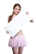Photo: Young girl holding a blank billboard. Young girl holding a blank billboard.