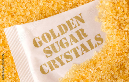 Photo: close up of golden sugar crystals close up of golden sugar crystals