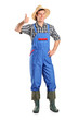 A young smiling farmer giving a thumb up A young smiling farmer giving a thumb up