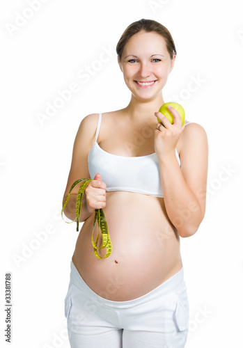 Photo: sporty clothes holding apple sporty clothes holding apple