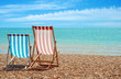 beach chairs at the ocean