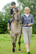 Horse riding - little girl is riding a horse