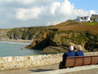 Retired Couple Looking Over Sea View