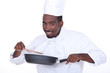 Cheerful cook on white background