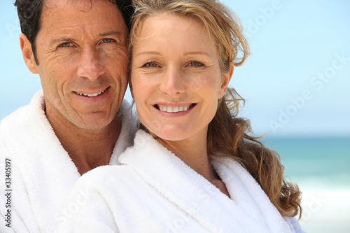 Photo: A man and a woman wearing dressing gowns A man and a woman wearing dressing gowns