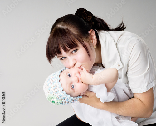 Photo: Mother kisses the daughter Mother kisses the daughter