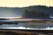 Beauty sunrise on the fog in mountain lake