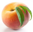 Ripe peach with leaves