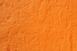 mur crépité orange