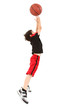 Photo: Energetic Boy Child Jumping with Basketball Energetic Boy Child Jumping with Basketball