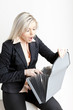 portrait of young businesswoman with folders