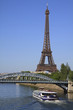 Eiffel tower and boat on Seine river