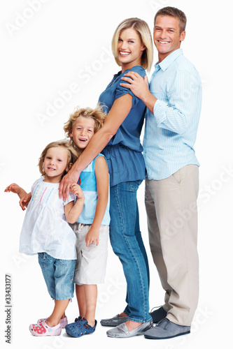 Photo: Happy family standing in row Happy family standing in row