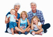 Senior couple with cute grandchildren