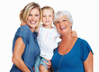 Three generation family smiling together